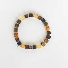 Load image into Gallery viewer, Bracelet with multicolored Baltic amber square beads on a white background with Vytis