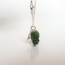 Load image into Gallery viewer, Necklace with a green stone pendant on a white background