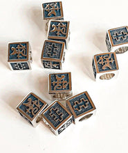Load image into Gallery viewer, Set of silver and blue cube-shaped jewelry pieces on a white background