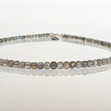 Load image into Gallery viewer, beaded necklace on a white surface